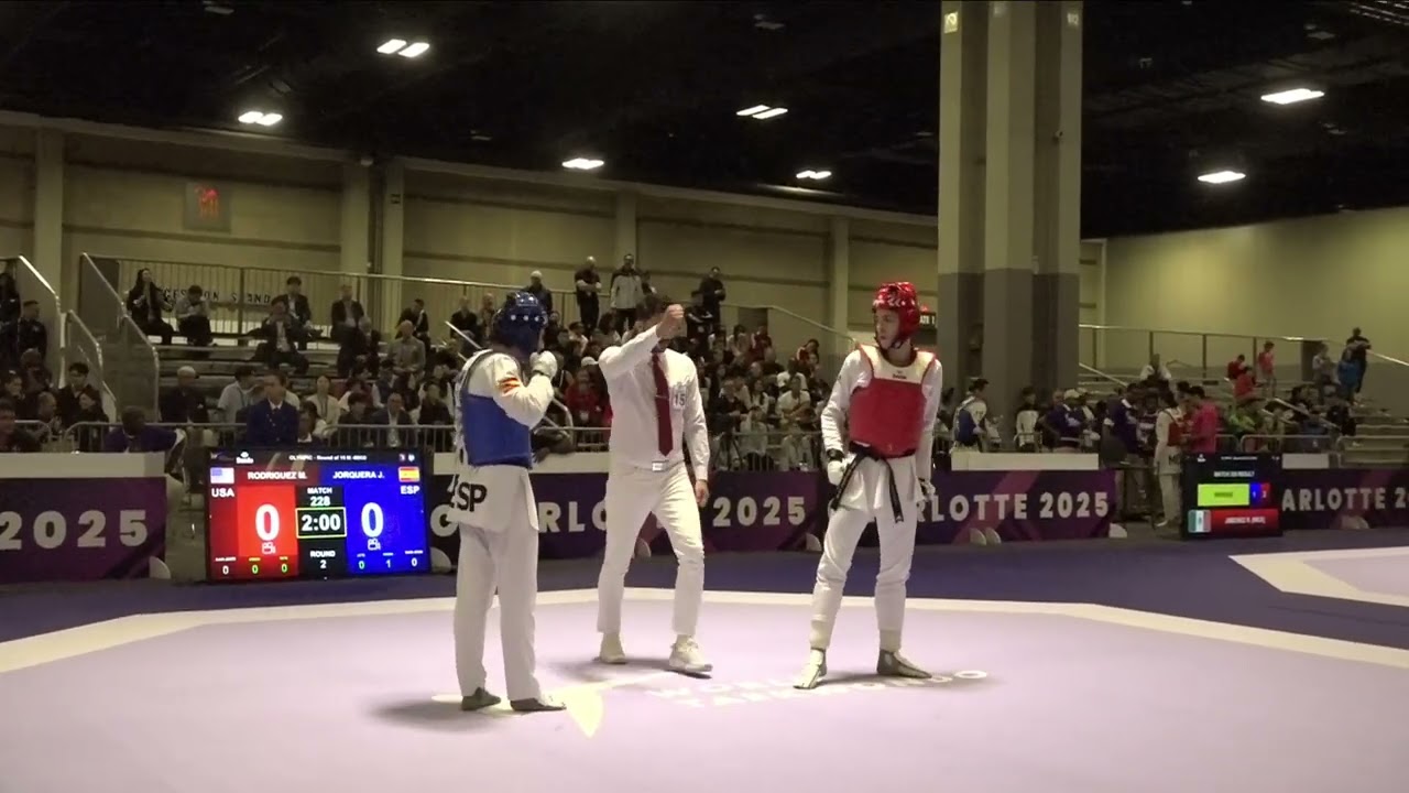 228 Round of 16 M 68kg ESP J JORQUERA USA M RODRIGUEZ PGM background