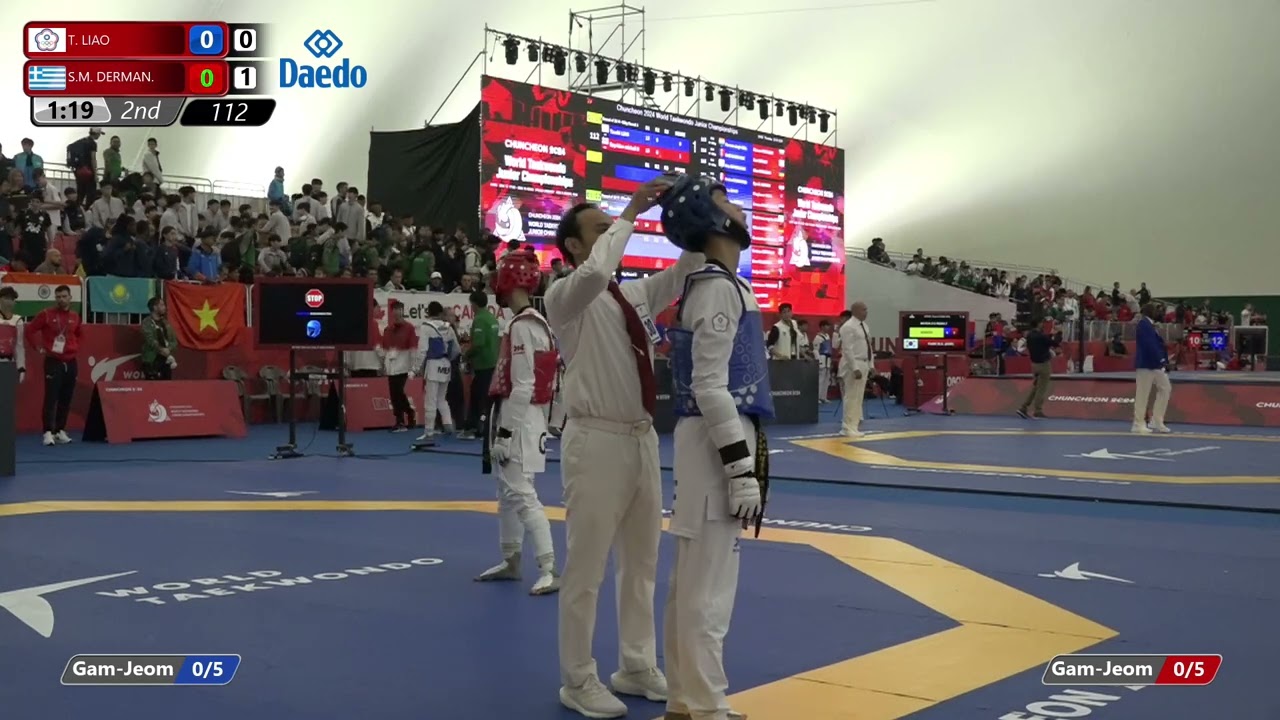 112 Round of 32 Men 55kg TPE T LIAO GRE S M DERMAN background