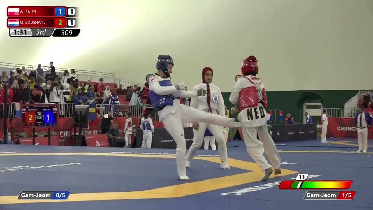 309 Round of 32 Women 49kg POL W BAJER NED M BOUSNANE background