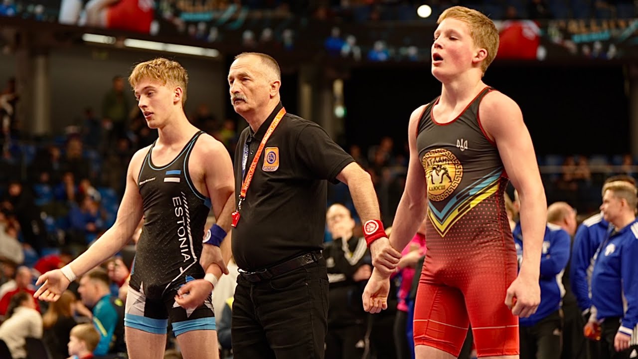 U17 Andriy Pavlov (UKR) vs Kened Mägisalu (EST) 65kg. Greco-roman boys wrestling. background