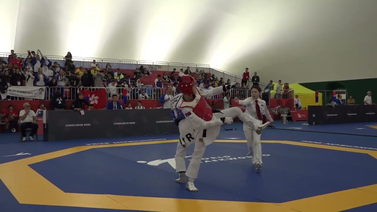 410 Round of 32 Women 49kg IRI HEIDARI Rozan SRB KUKIC Iva background