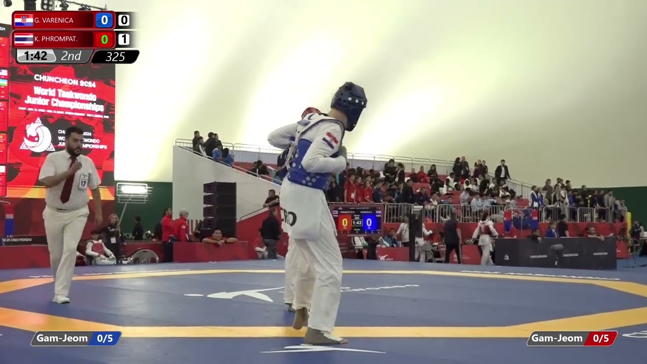 325 Round of 16 Men 68kg CRO G VARENICA THA K PHROMPAT background