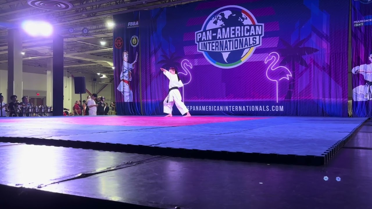 Raegan Campbell 13 & Under Girls Forms Overall Grand Championship - Pan American Internationals 2024 background