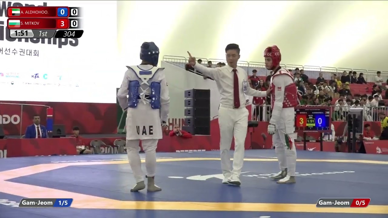 304 Round of 64 Men 63kg UAE A ALDHOHOO BUL S MITKOV background