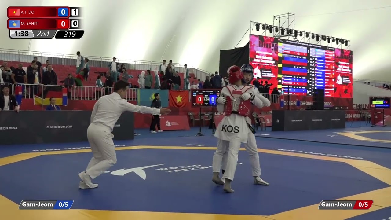 319 Round of 32 Men 68kg VIE A T DO KOS M SAHITI background