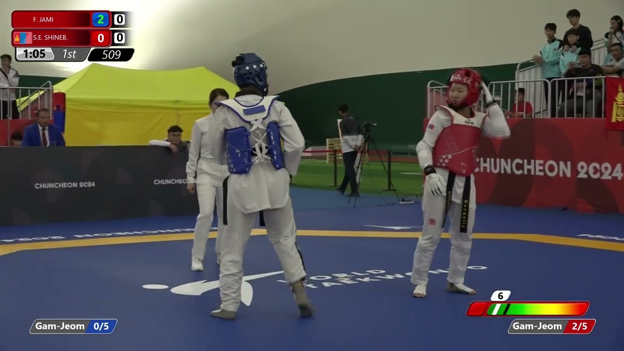 509 Round of 64 Women 59kg RTA F JAMI MGL S E SHINEB background