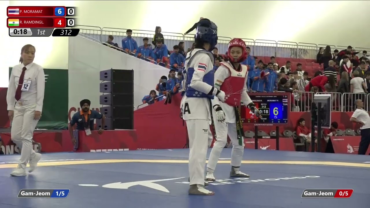 312 Round of 32 Women 52kg THA P MORAMAT IND R RAMDINGL background