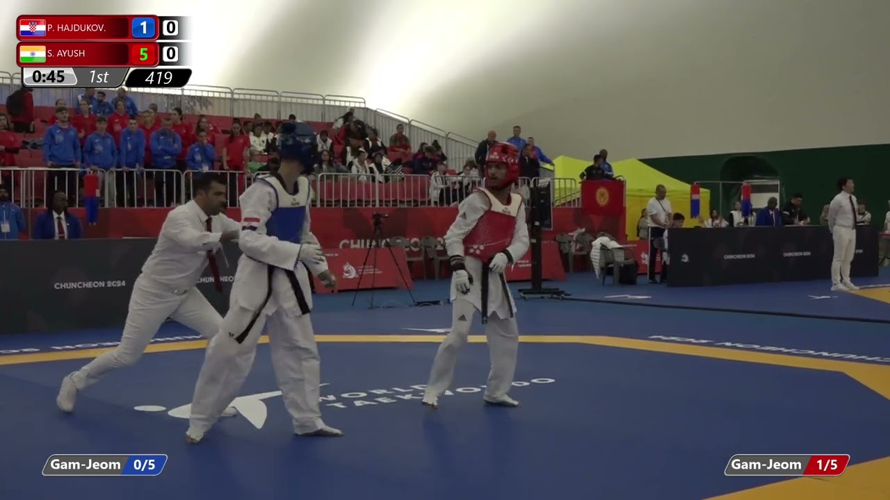 419 Round of 32 Men 51kg CRO P HAJDUKOV IND S AYUSH background