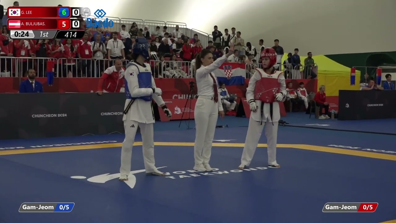 414 Round of 32 Women 63kg KOR G LEE AUT A BULJUBAS background