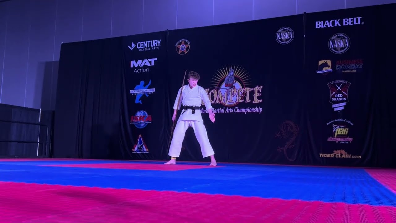 Nolan Grunwald 14-17 Boys Weapons Overall Grand Championship backdrop