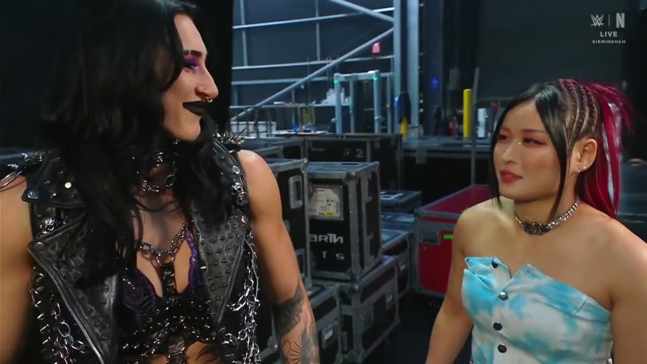 Iyo Sky hugs Rhea Ripley | Raw Aug 25, 2025 background