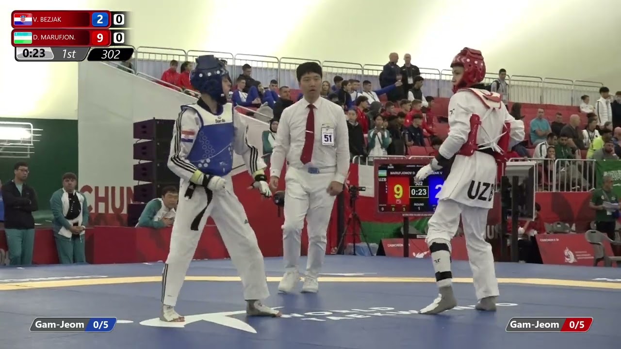 302 Round of 64 Men 45kg CRO V BEZJAK UZB D MARUFJON background