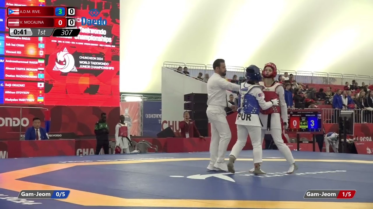 307 Round of 64 Women 63kg PUR A D M RIVE LAT V MOCALINA background