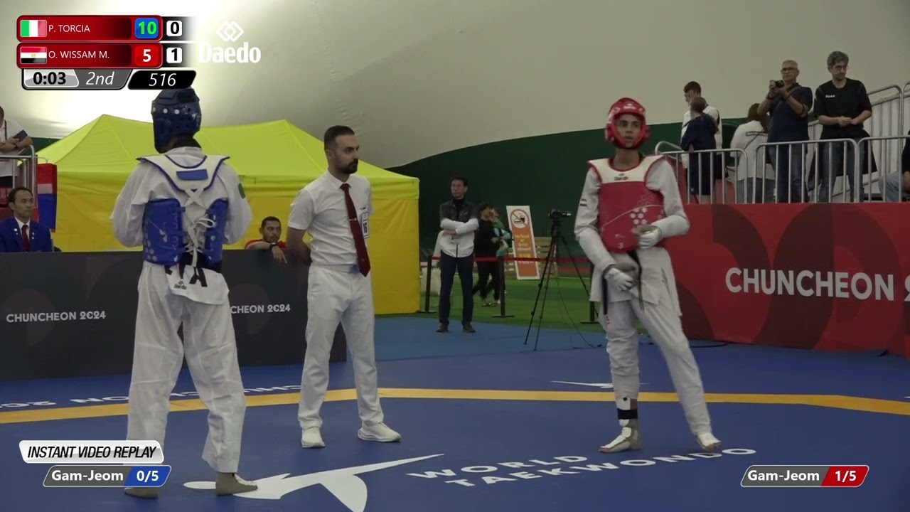 516 Round of 32 Men 63kg ITA P TORCIA EGY O WISSAM M background