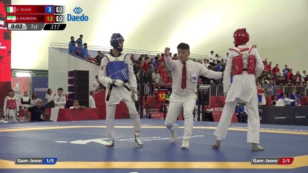 317 Round of 32 Men 51kg ITA A TOUIAR IRI A NASIRAHM background