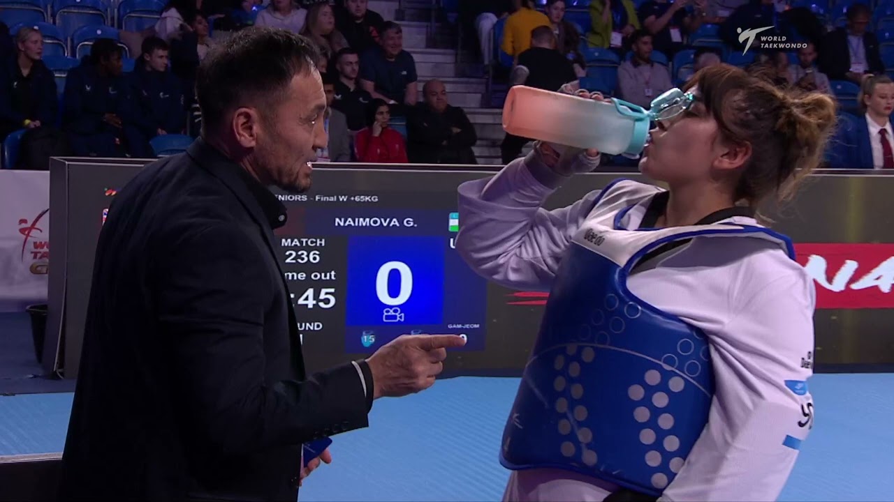 236 Final WOMEN W +65KG UZB NAIMOVA G GBR TRUESDALE A background