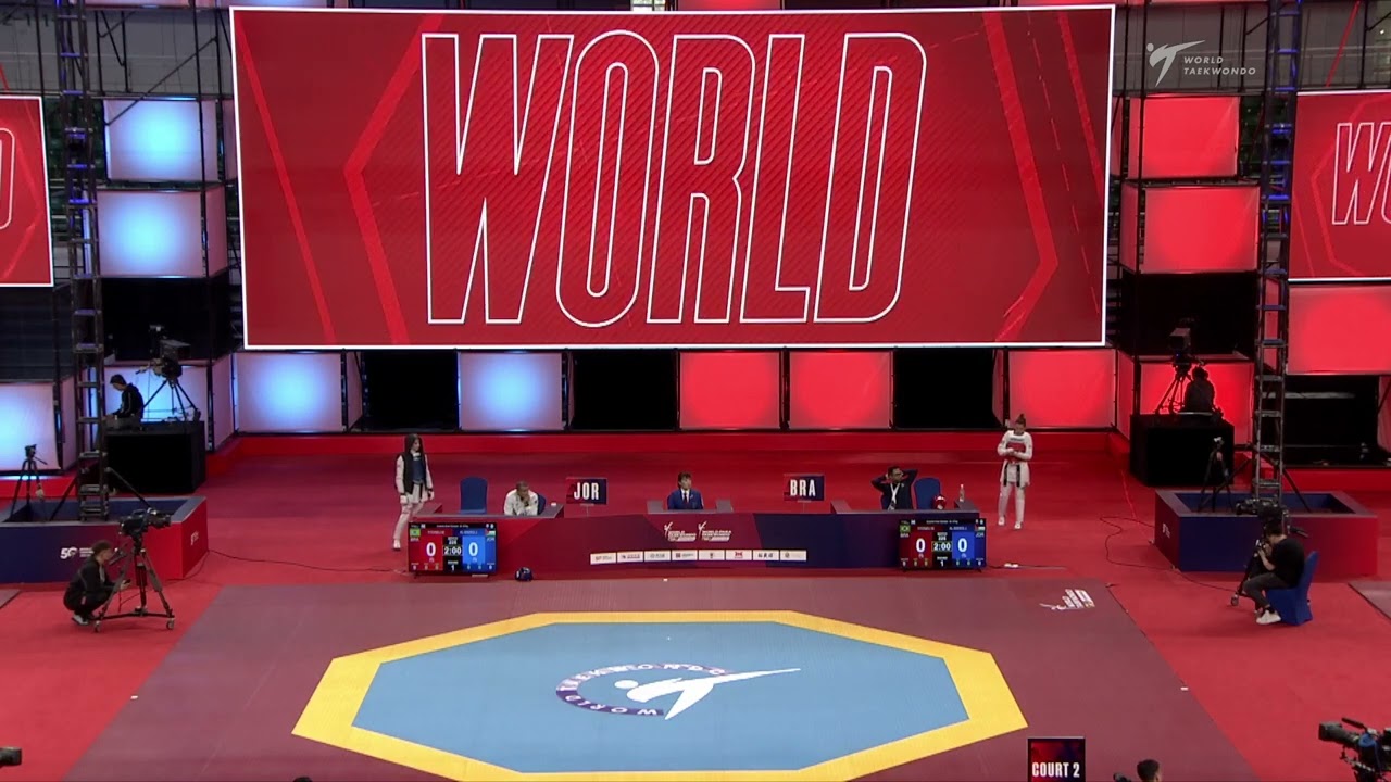 225 Quarter final W 67kg JOR AL SADEQ J BRA TITONELI M background