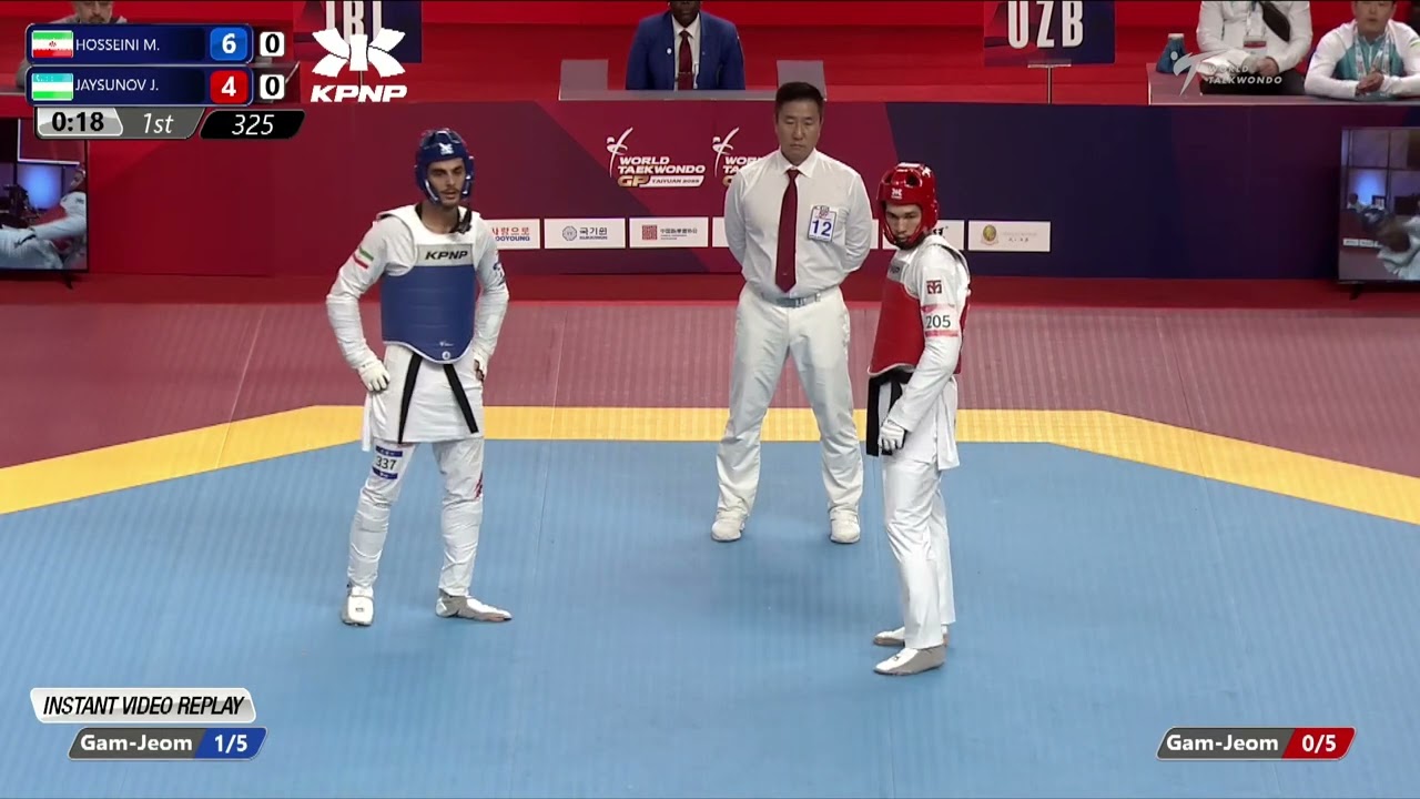 325 Quarter final M 80kg IRI HOSSEINI M UZB JAYSUNOV J