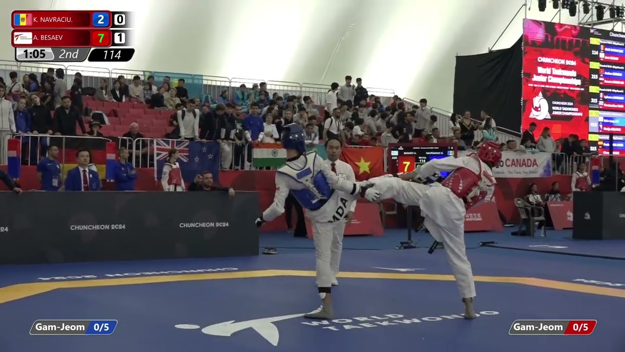 114 Round of 32 Men 55kg MDA K NAVRACIU AIN A BESAEV background