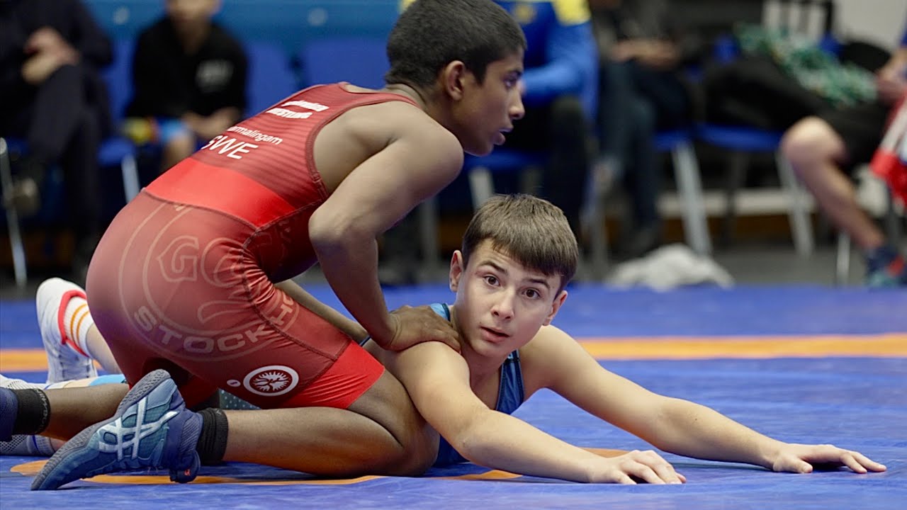 U15 S. Tharmalingam (SWE) vs K. Karakasidi (UKR) 52kg. Youth boys greco-roman wrestling.