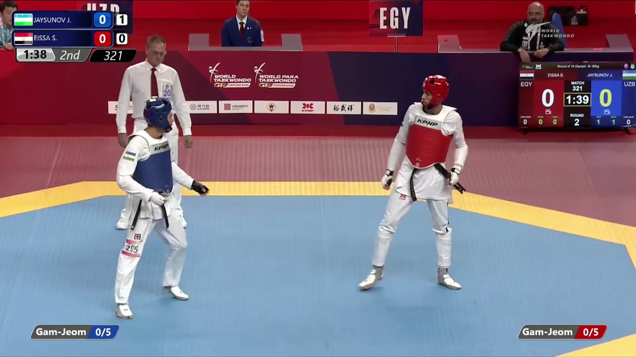 321 R16 M 80kg UZB JAYSUNOV J EGY EISSA S background