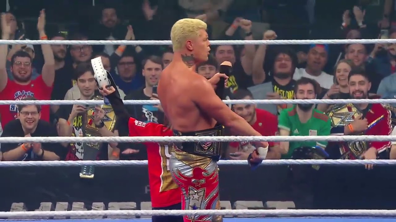 Cody Rhodes gifts his belt to a fan in Barcelona: SmackDown Dark, Mar. 14, 2025 background