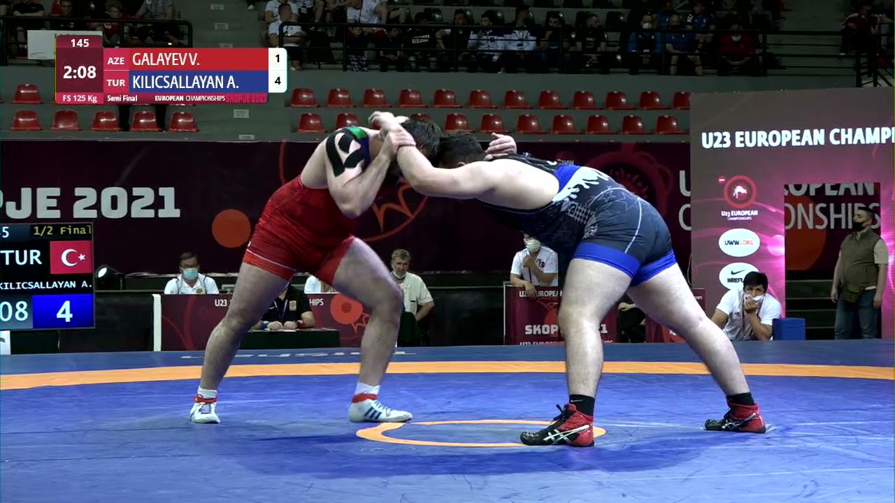 1/2 FS - 125 kg: V. GALAYEV (AZE) v. A. KILICSALLAYA (TUR) background