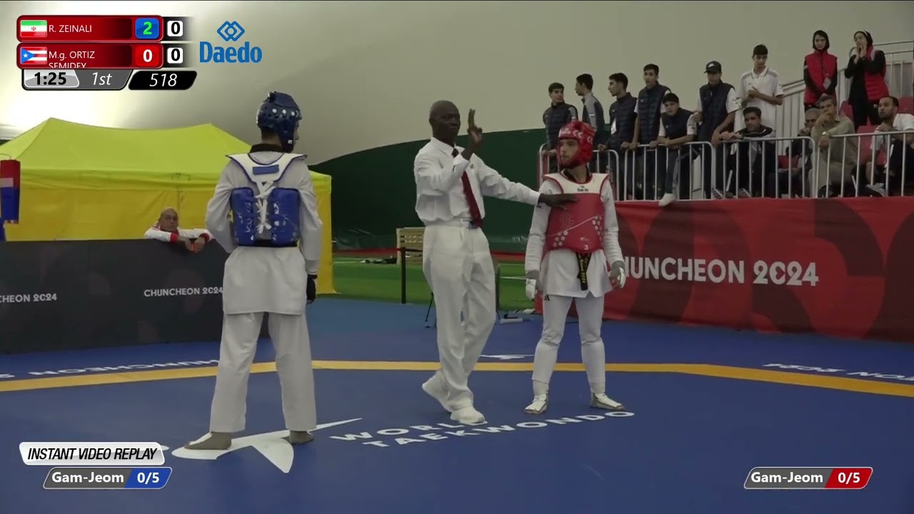 518 Round of 32 Men 68kg IRI R ZEINALI PUR M g ORTIZ SEMIDEY background