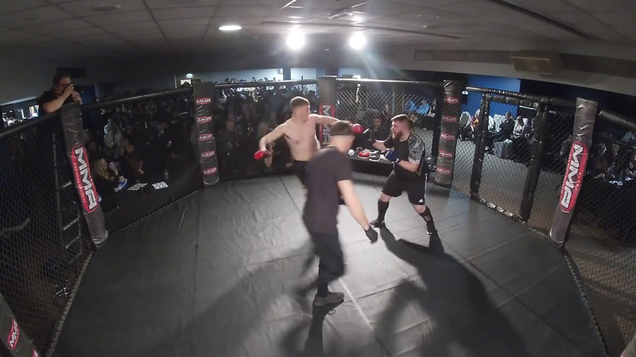 WIGAN | ULTRA MMA | MATTHEW MYERS VS BEAU TIDMAN background