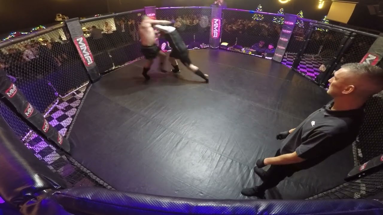COVENTRY | ULTRA MMA | DANIEL WELLS VS MICKY 2 GUNS MCSWEEN backdrop