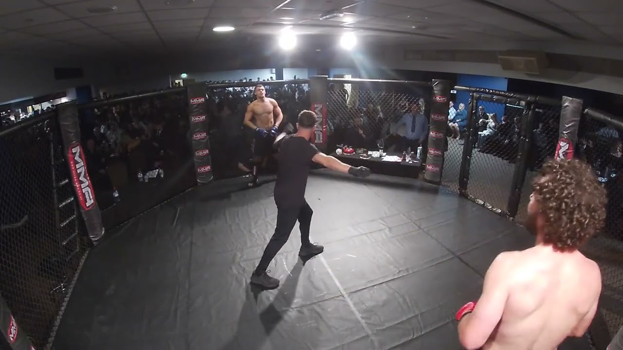 WIGAN | ULTRA MMA | CHARLES VAN VUUREN VS LUKE HESFORD background