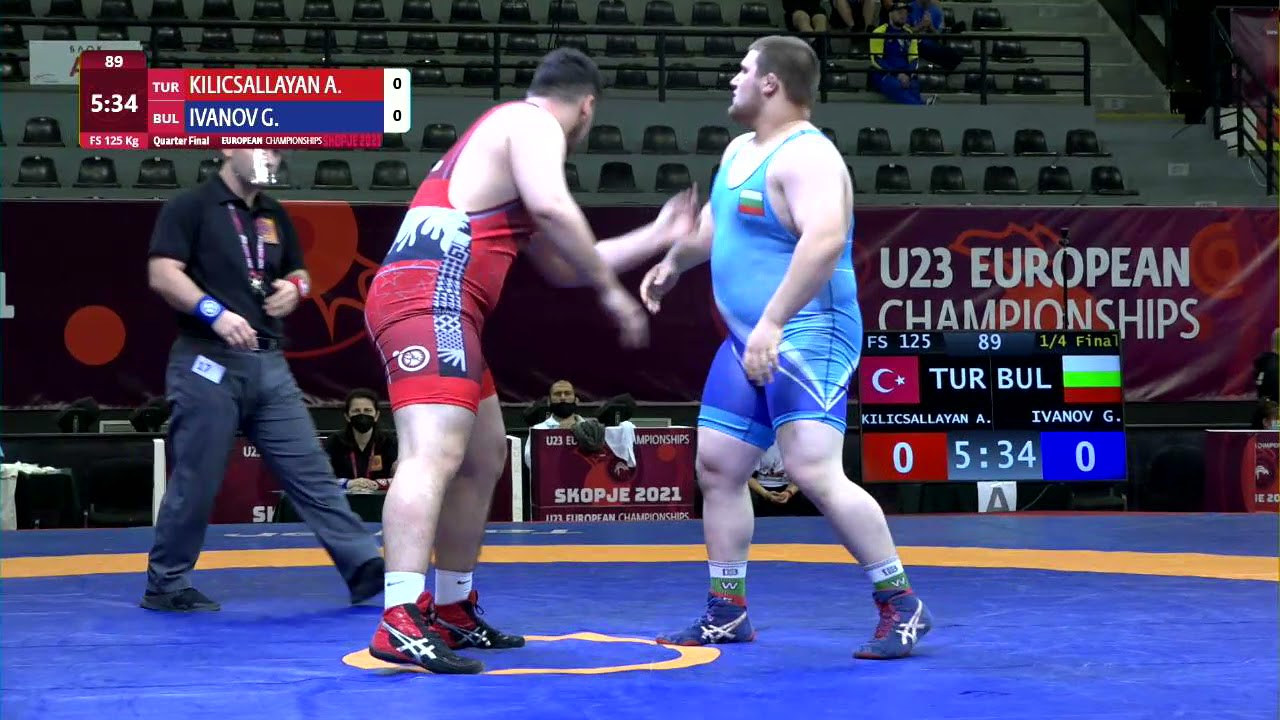 1/4 FS - 125 kg: A. KILICSALLAYA (TUR) v. G. IVANOV (BUL) background