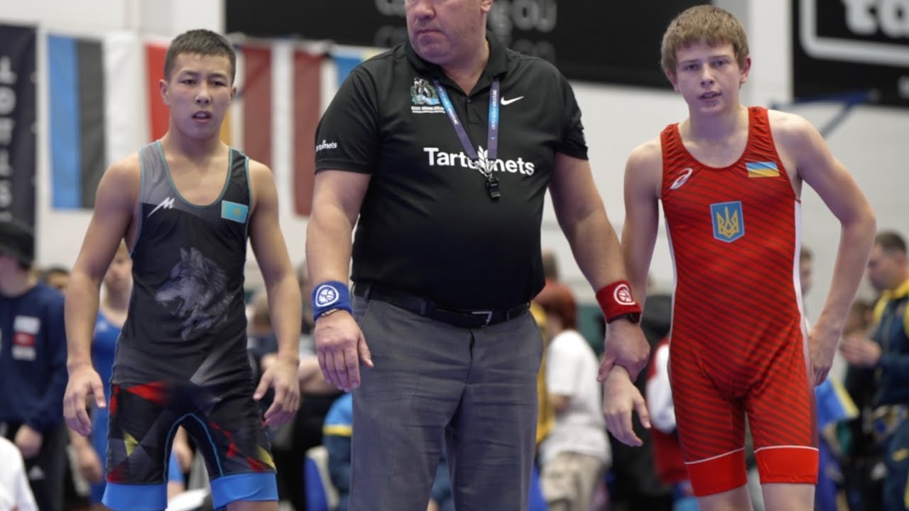 U17 S. Naumov (UKR) vs M. Sansyzbay (KAZ) 48kg final. Youth boys greco-roman wrestling. background