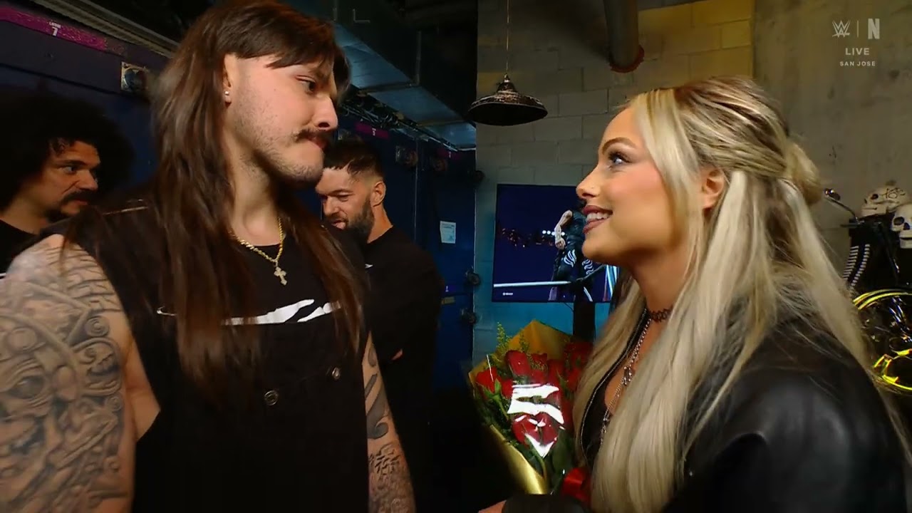 Liv Morgan throws the flowers that Dominik Mysterio gave her to the ground: Raw, Jan. 13, 2025 background