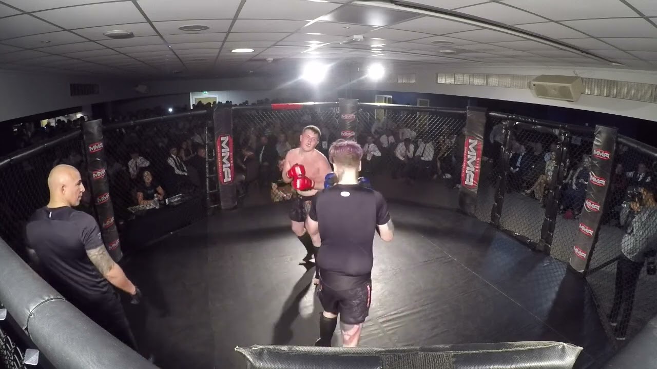 WIGAN | MMA | NATHAN ARMSTRONG VS SCOTT MCINTOSH background