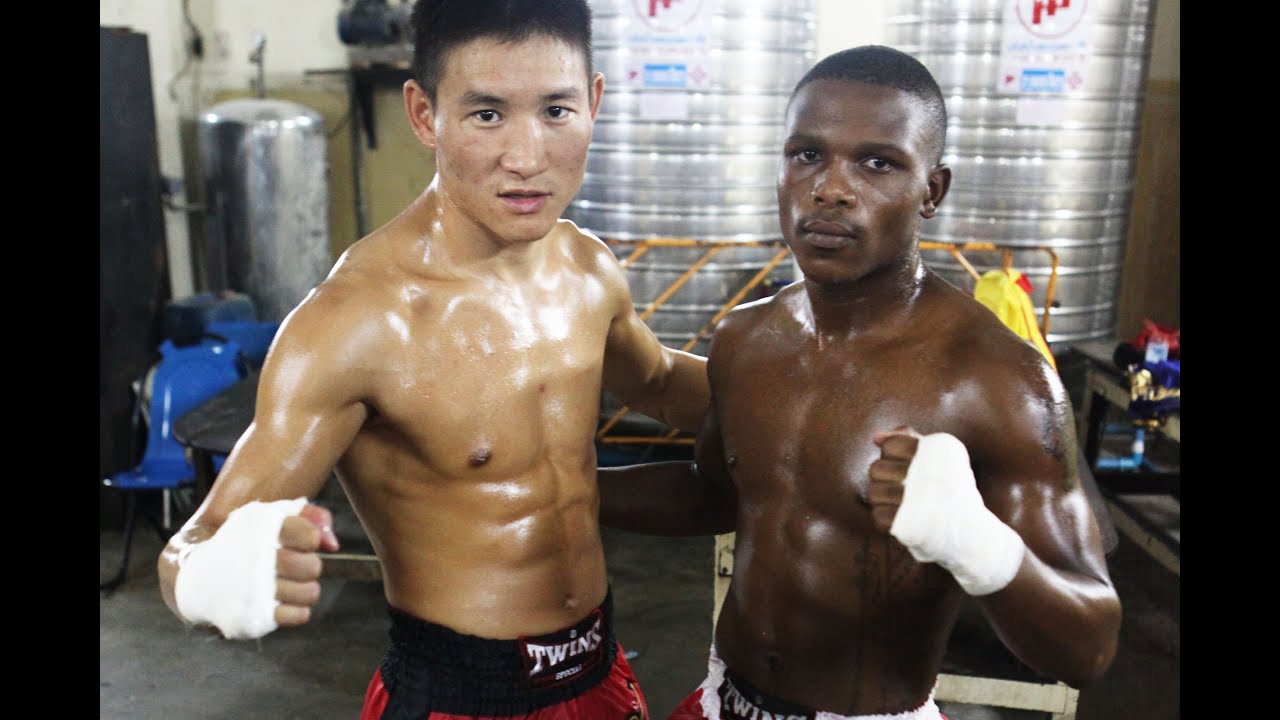 Ncedo Gomba and Grigory Popov:Journey to Rajadamnern Stadium background
