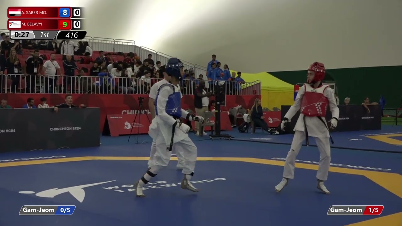 416 Round of 32 Men 45kg YEM A SABER MO AIN M BELAVYI background
