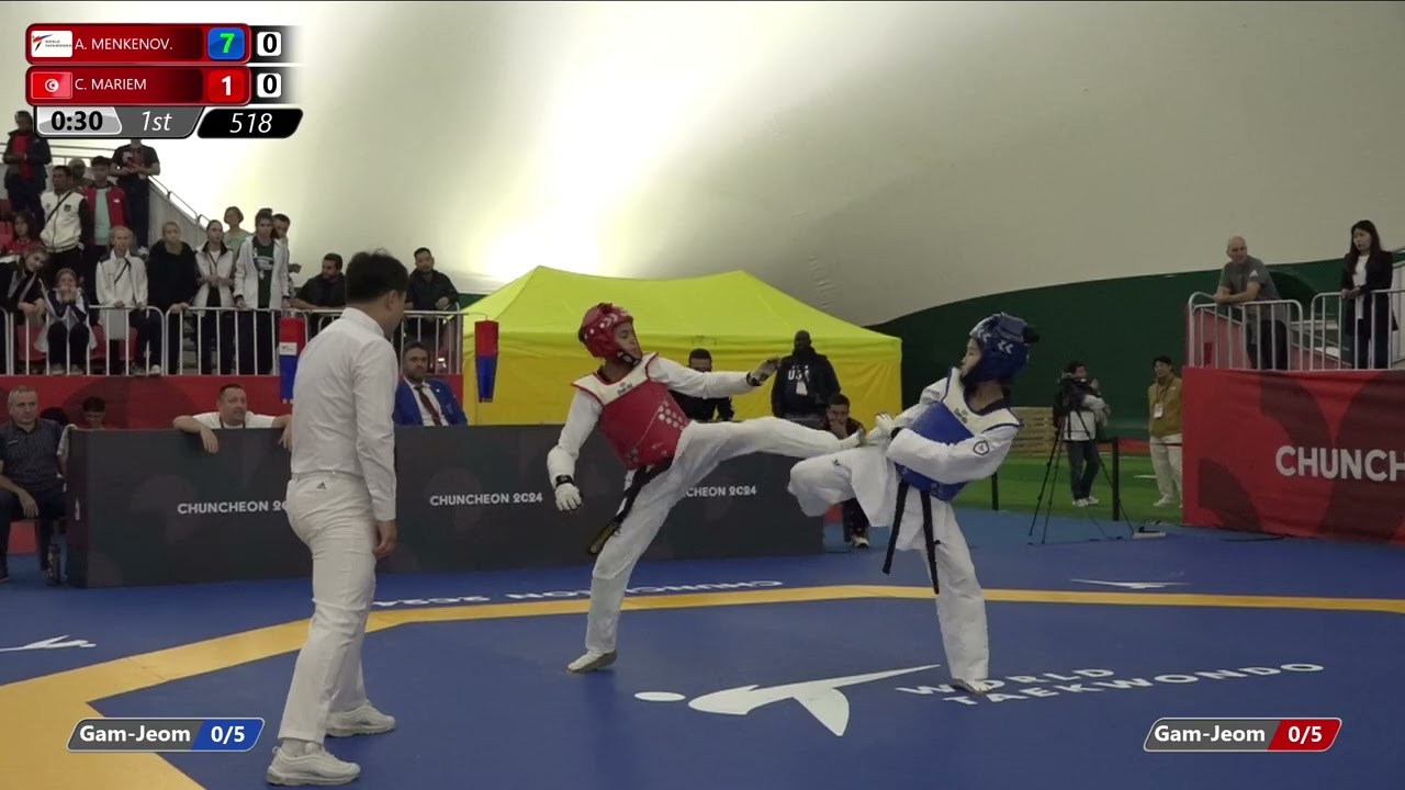 518 Round of 16 Women 49kg AIN A MENKENOV TUN C MARIEM background