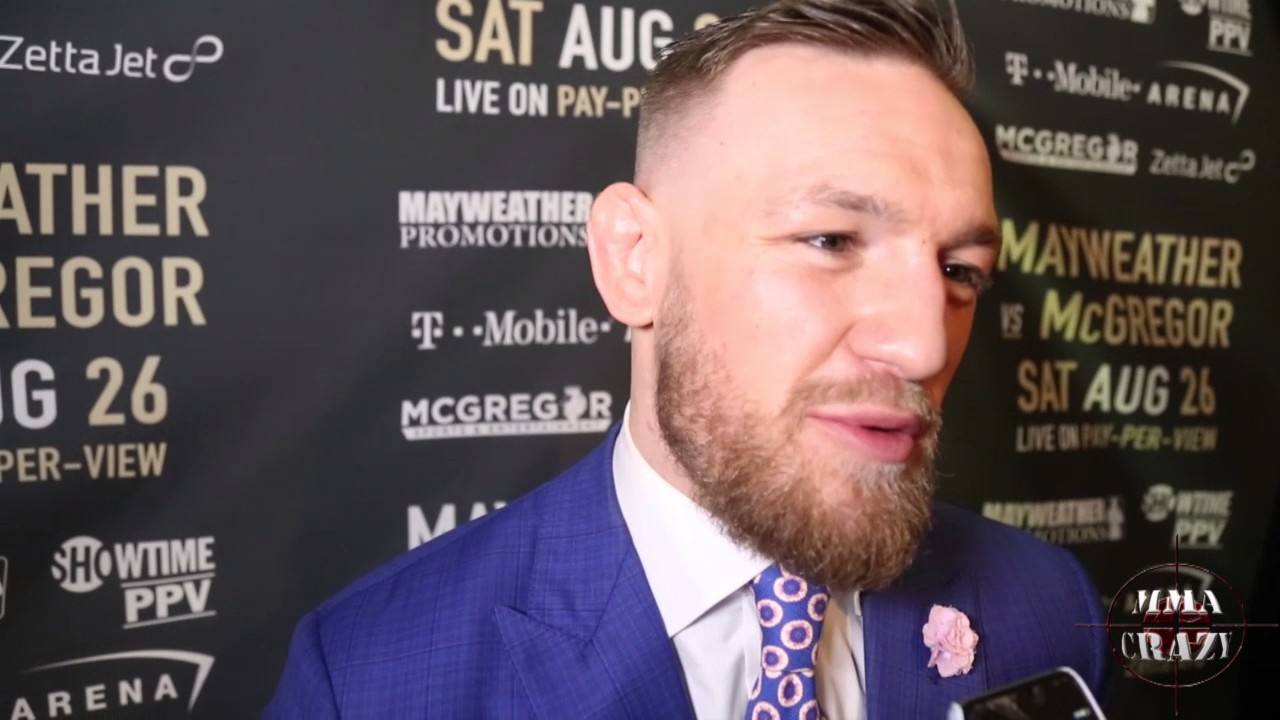 Conor McGregor tells Floyd Mayweather "that bullsh*t is over now boy, I'm gonna fuck you up" background