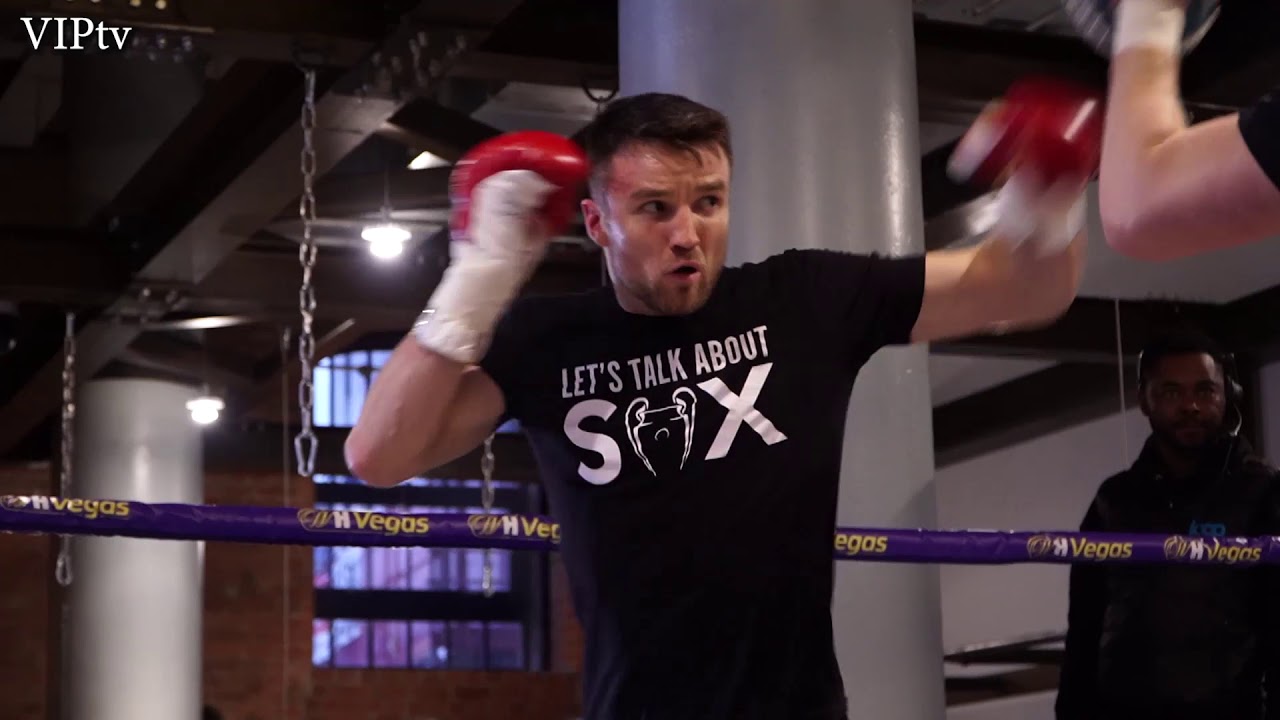 Anthony Fowler on pads with new coach Shane McGuigan for Mar 7th, Manchester Arena. background