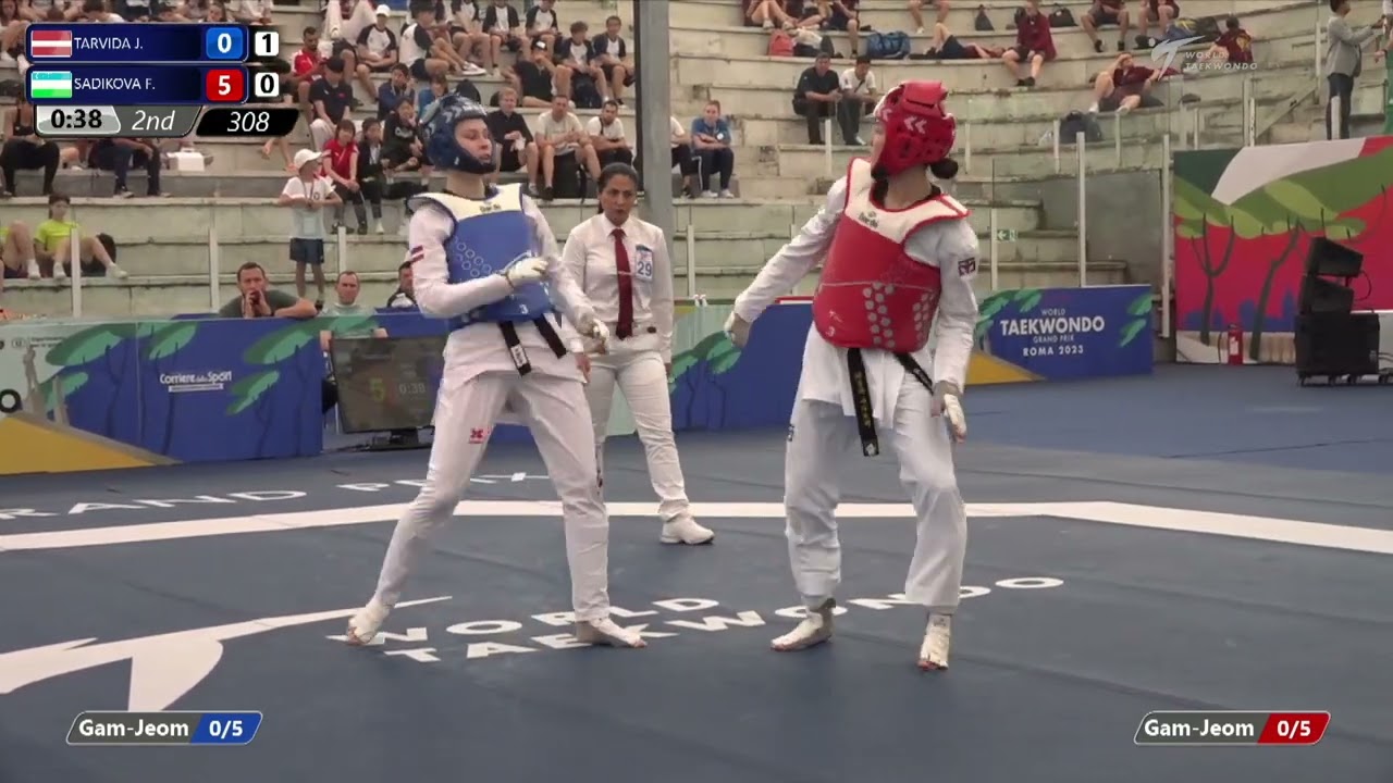 308 Round of 32 WOMEN W 67KG LAT TARVIDA J UZB SADIKOVA F background