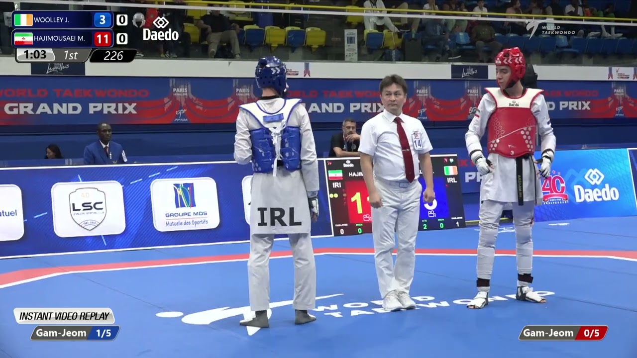 226 Quarterfinals MEN M 58KG IRL WOOLLEY J IRI HAJIMOUSAEI M background