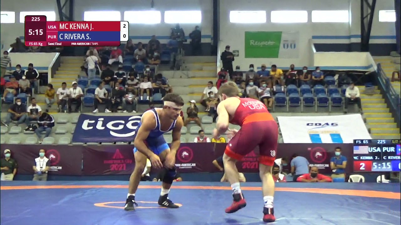 1/2 FS - 65 kg: J. MC KENNA (USA) v. S. C RIVERA (PUR)