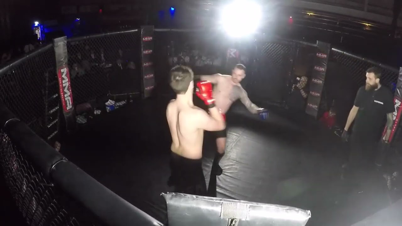 Ultra MMA | Cardiff | Ewan Jackson V Corey Williams background