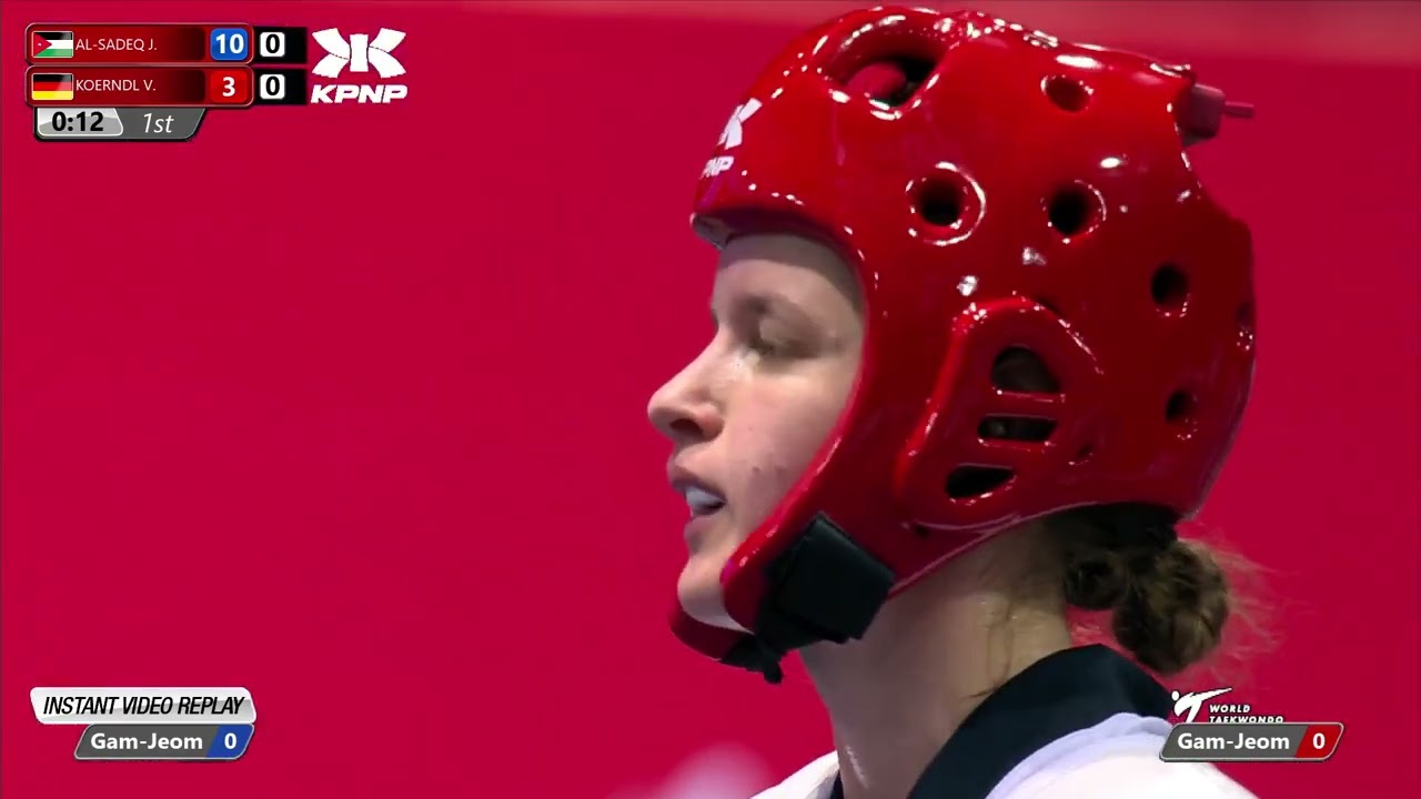 228 Quarter Final Women 67kg JOR AL SADEQ Julyana GER KOERNDL Vanessa background