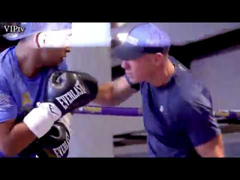 Aqib Fiaz on pads with coach Jamie Moore for Mar 7th, Manchester Arena background