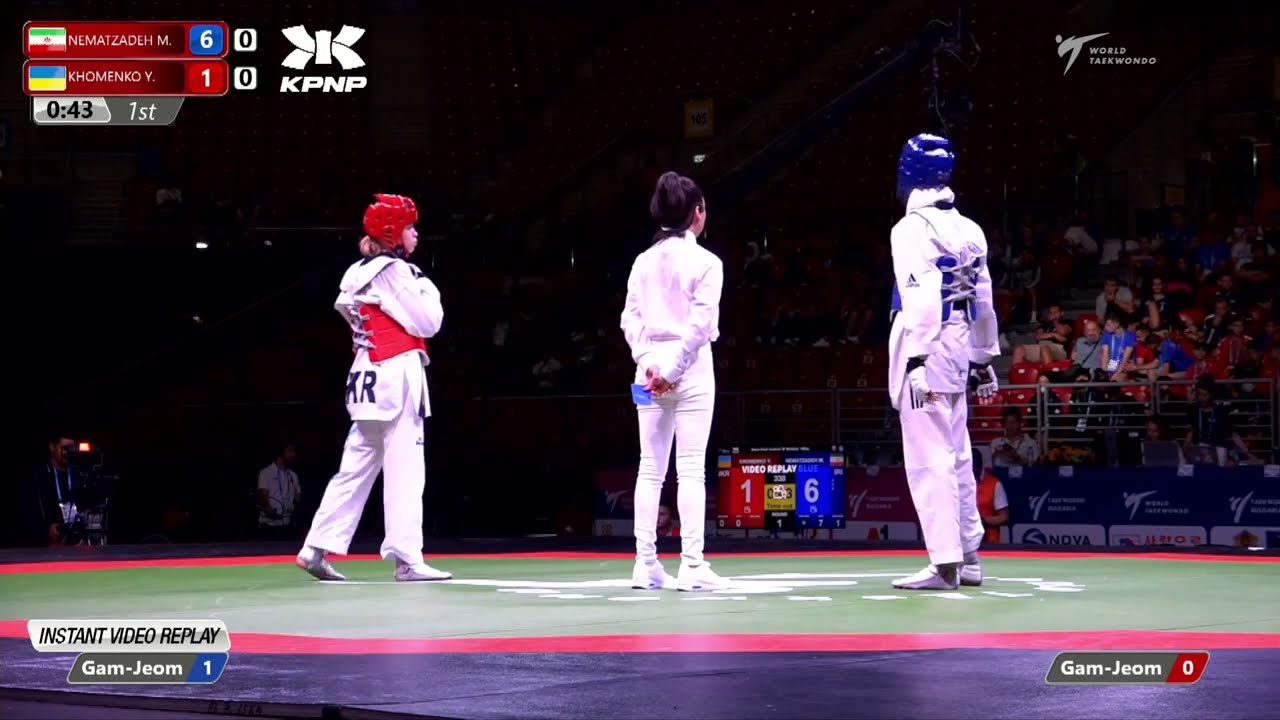 338 SF Women 49kg IRI NEMATZADEH M UKR KHOMENKO Y background