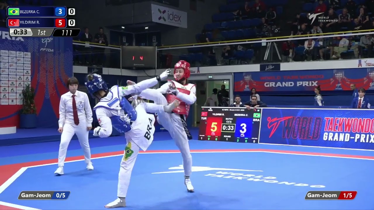 111 Round of 32 WOMEN W 49KG BRA BEZERRA C TUR YILDIRIM R background