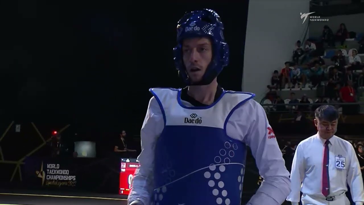 410 M-80kg R-32 TELIKOSTOGLOU A. GRE 🔵 vs 🔴 GONZALEZ A. PUR I Guadalajara 2022 WT Championships background