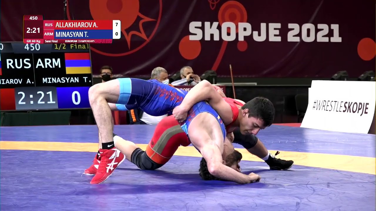 1/2 GR - 60 kg: A. ALLAKHIAROV (RUS) v. T. MINASYAN (ARM) background